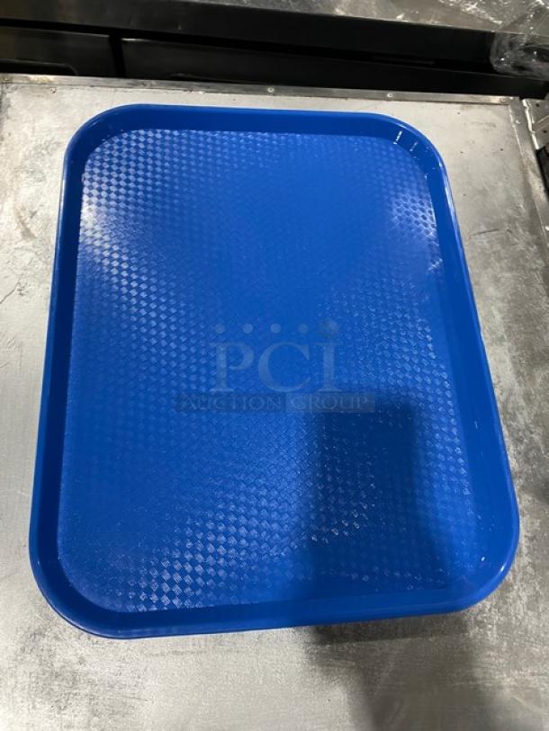 Cambro blue 14"x18" rectangular serving tray, model 1418FF168. New condition, commercial-grade with textured surface.