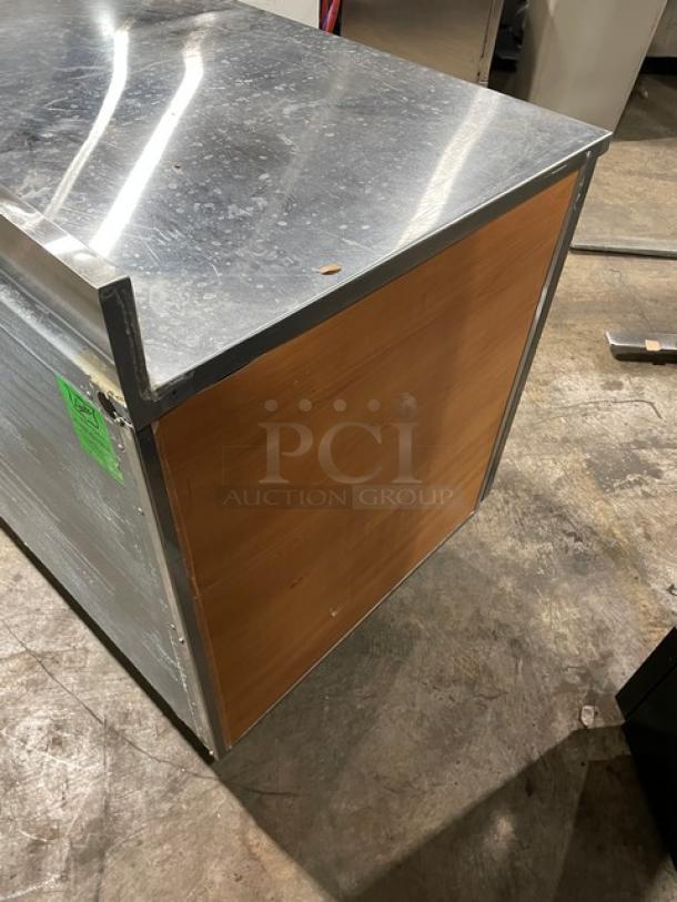 Duke RBC60M stainless steel 2-door worktop refrigerator with upturned backsplash, shown on legs; Model: RBC-60M.