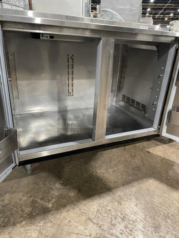 Duke RBC60M stainless steel 2-door worktop refrigerator, up-turned back splash, model RBC-60M, 120V 1 phase, on legs.