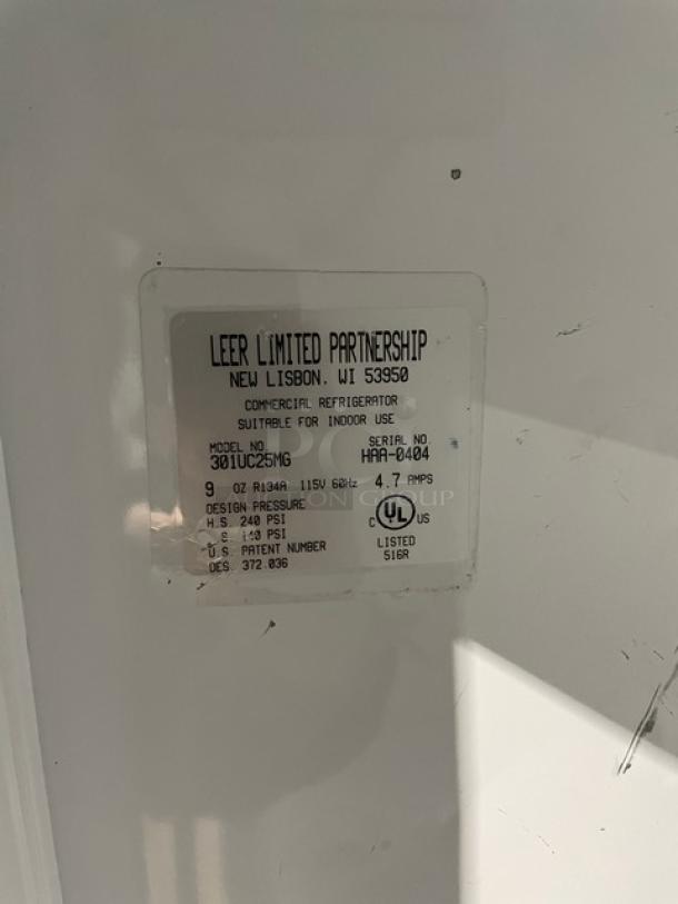 Leer Commercial Ice Merchandiser Freezer, Model 301UC25MG, white, single glass swing door, indoor use, 115V, SN: HAA-0404.
