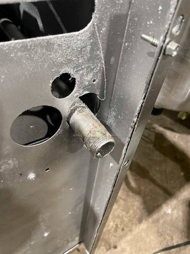 U.S. Range commercial stainless steel 6-burner gas range base, enclosed cabinet, caster wheels, slight wear.