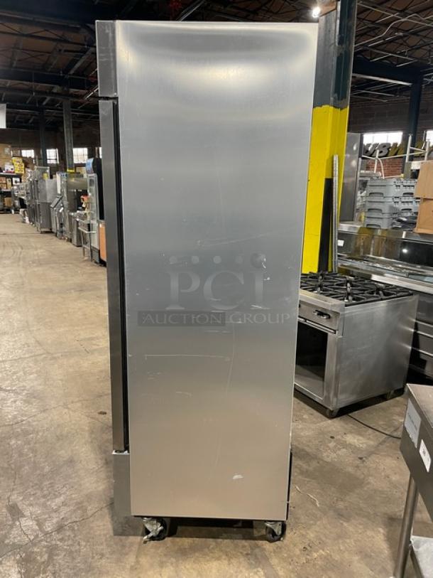 True T-35-HC stainless steel 2-door reach-in refrigerator with poly coated wire rack. 115V, 1-phase, on casters.