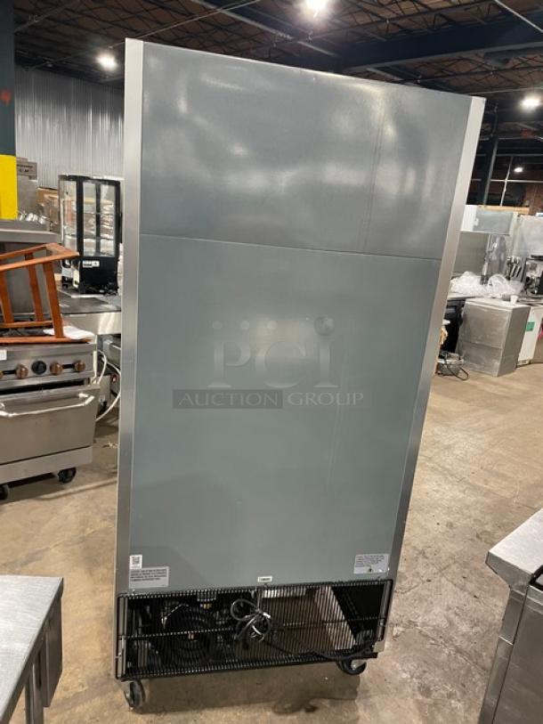 True T-35-HC stainless steel 2-door reach-in refrigerator, poly-coated rack, 115V, on casters, serial 9533160.