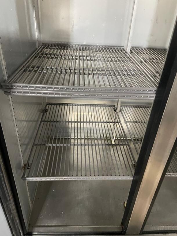 True T-35-HC commercial refrigerator interior, featuring poly-coated wired racks, stainless steel, on casters, SN: 9533160.