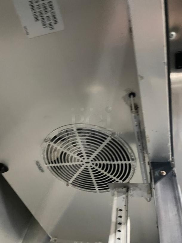 True T-35-HC stainless steel 2-door reach-in refrigerator, on casters, with poly-coated wire rack. Model T35HC, 115V 1 Phase.