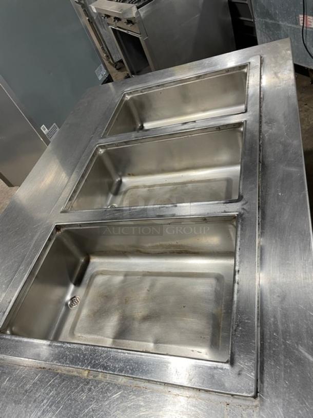 Wells MOD300TDM stainless steel 3-well steamtable with single undershelf. Electric, 208/240V, on legs, used condition.
