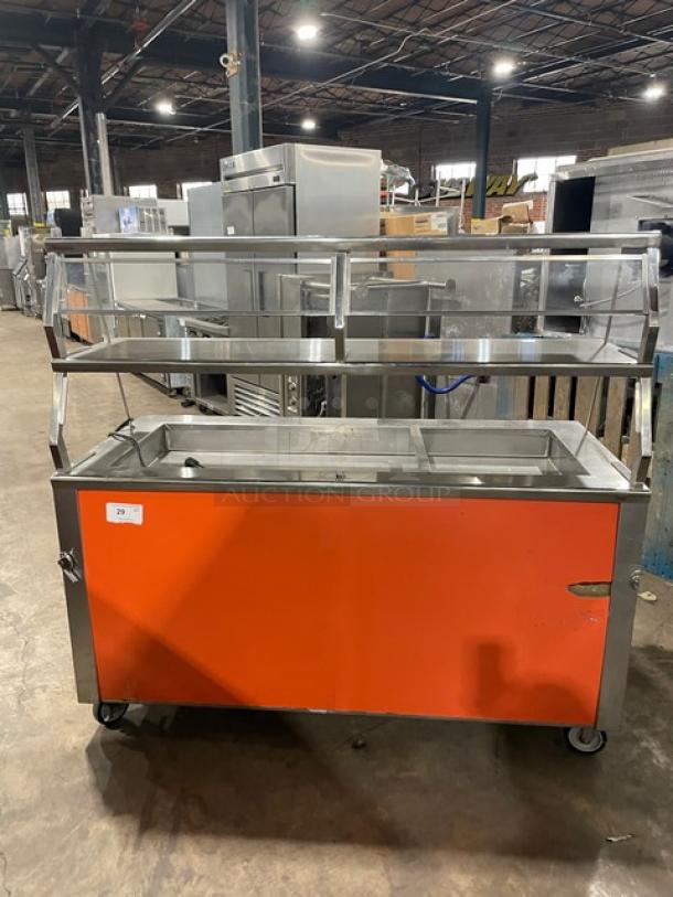 Precision SST-2024-RT-NYC refrigerated cold food salad bar with double overhead sneeze guard, rear cabinet, and wheels.