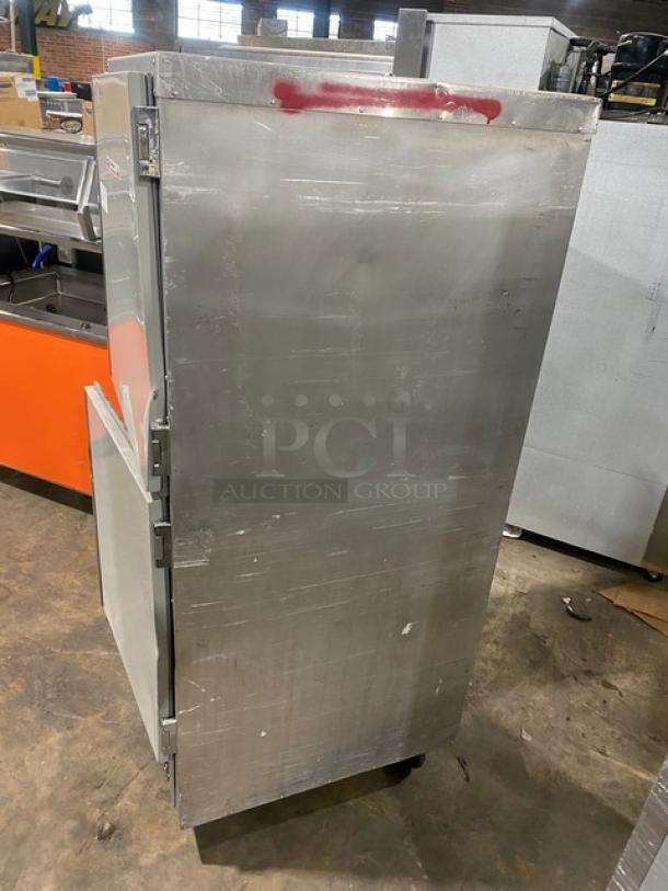 Metro Flavor Hold Series insulated heated holding cabinet, model C199H1N, on casters, visible wear, half door, wide pan slides.