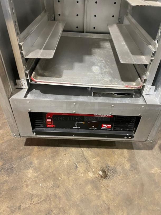 Metro Flavor Hold Series heated holding cabinet, model C199H1N. Features include wide pan slides, half door, 120V, on casters.