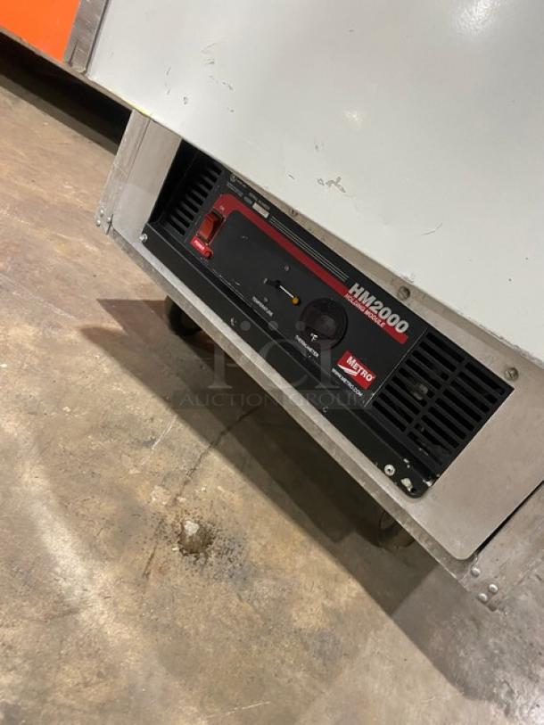 Metro C199H1N Heated Holding/Proofing Cabinet, single section, insulated, on casters, wide pan slides, 120V, good condition.