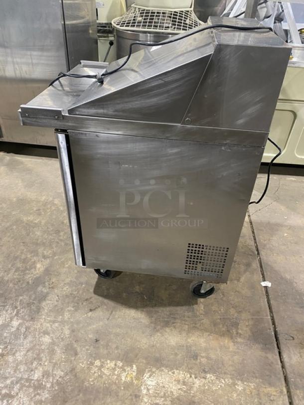 Atosa stainless steel single door prep table with poly-coated rack, on casters, refrigerated, 115V 1 Phase.