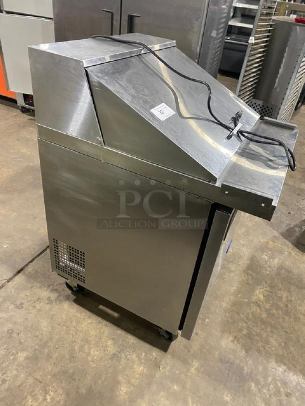 Atosa commercial stainless steel single door refrigerated prep table with poly-coated rack, 115V, on casters.