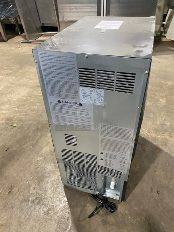 Maxx Ice stainless steel ice maker model MIM50, new condition, slight scratches, Energy Star certified, SN: 00500420057, 115V.