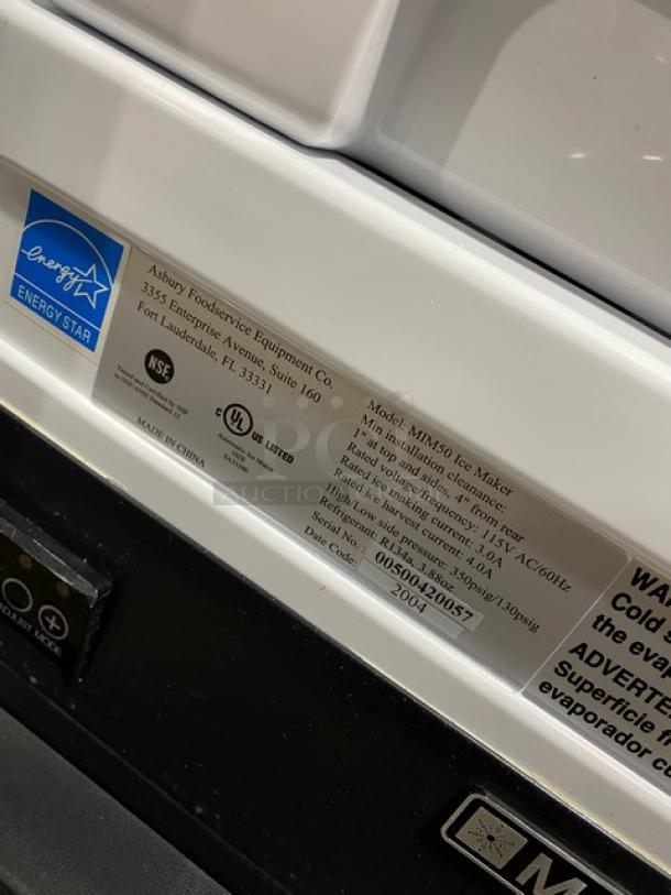 Maxx Ice MIM50 stainless steel ice maker/bin combo, Energy Star certified, model MIM50 SN: 00500420057, with visible tags.