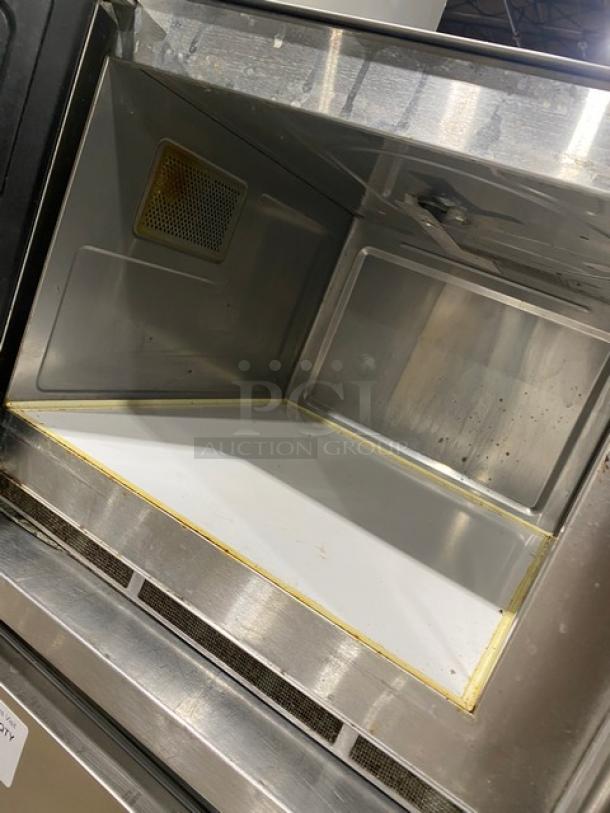 Amana RFS12SW2A stainless steel countertop microwave oven, interior view, digital controls, 120V, 1 Phase.