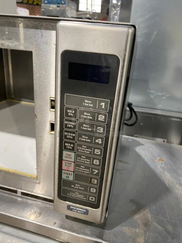 Amana RFS12SW2A commercial stainless steel microwave oven with digital control panel. Condition: Used, 120V 1 Phase.