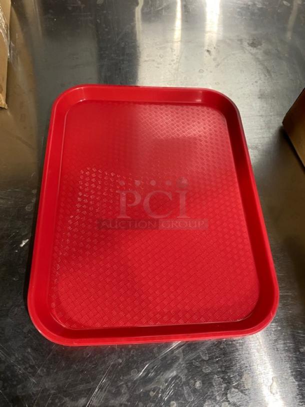 Red Cambro 10"x14" rectangular tray, model 1014FF163, new condition, textured surface, ideal for commercial use.