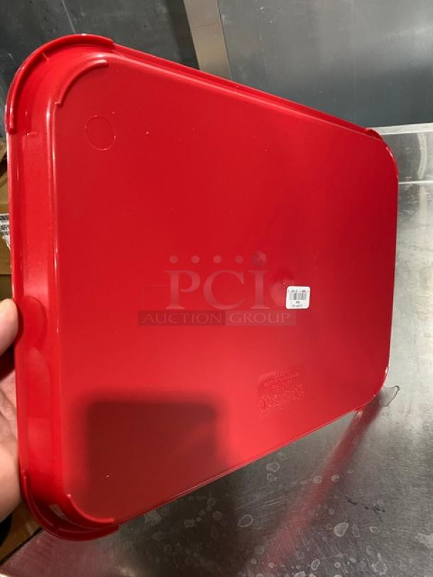 New Cambro 12"x16" red serving tray, model 1216FF163. Durable plastic, commercial grade, ideal for fast food use.