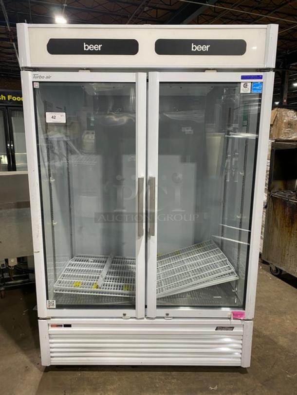 Turbo Air TGM-47SDW white double glass door merchandiser refrigerator, Energy Star certified, with poly-coated wire racks, on legs.