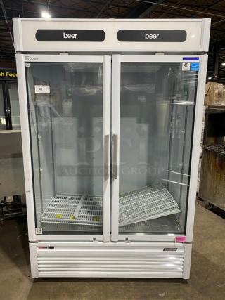 Turbo Air TGM-47SDW white double glass door merchandiser refrigerator, Energy Star certified, with poly-coated wire racks, on legs.