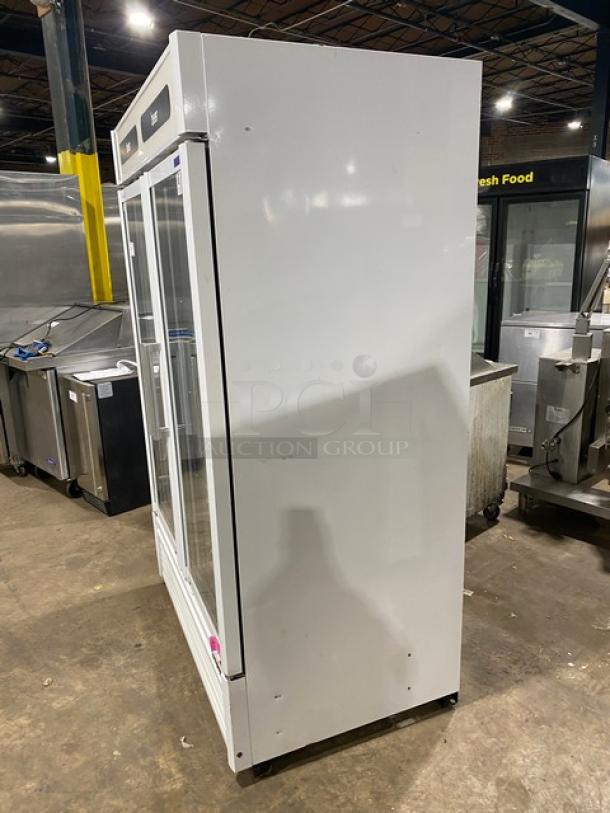 Turbo Air TGM-47SDW commercial white double glass door reach-in refrigerator, Energy Star certified, on legs, with poly coated wired rack.