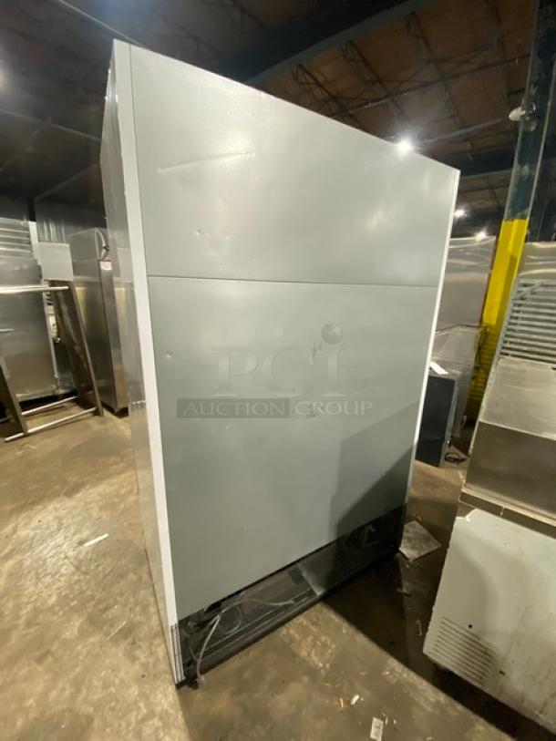 Turbo Air Commercial Refrigerator, TGM-47SDW, double glass swing doors, Energy Star certified, with poly coated rack, on legs.