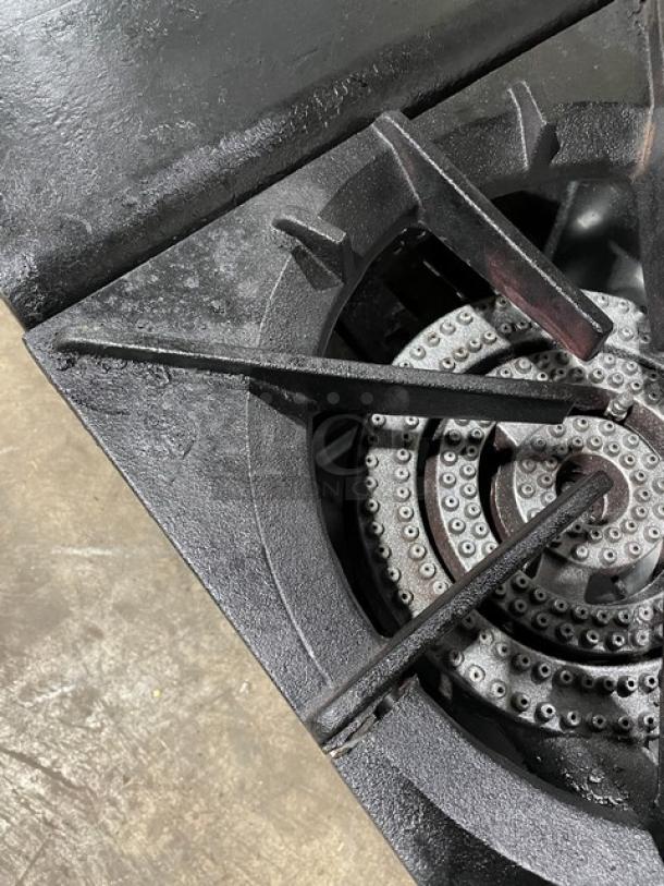 Cookline stainless steel gas double burner stock pot range with visible grate detail, in good condition, on legs.