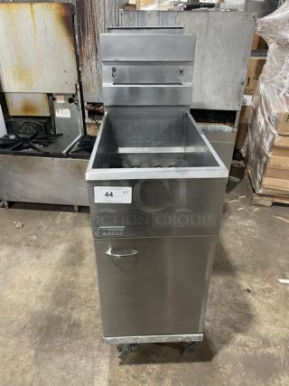 Pitco 40DSM commercial stainless steel deep fat fryer, natural gas powered, 40 lb. capacity, with backsplash, basket hanger, on casters.