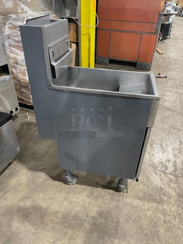 Pitco 40DSM stainless steel deep fat fryer, natural gas, 40 lb capacity, with back splash, basket hanger, on casters.