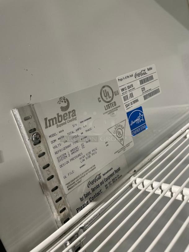 Imbera Elite Series G319 refrigerator label indicating Energy Star certification, model, voltage, and specs. Poly coated wire rack visible.