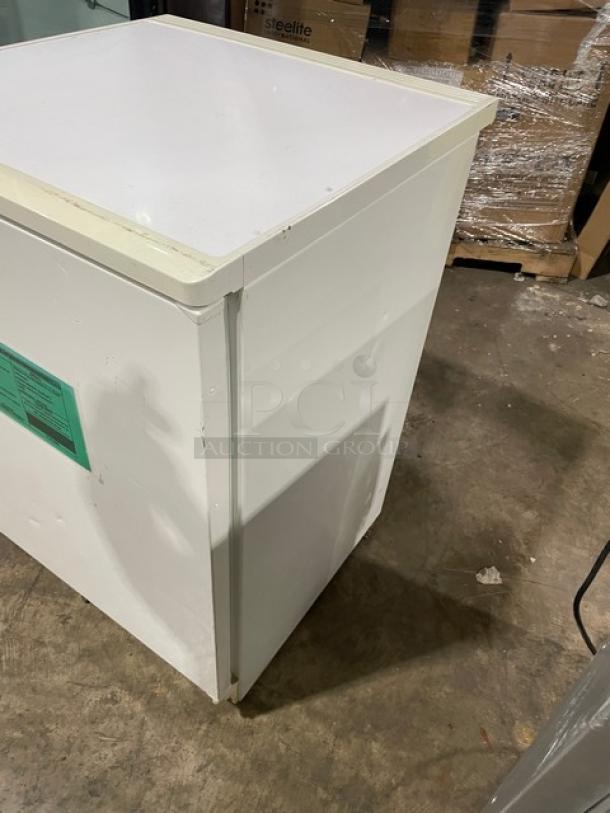 Fisher Scientific undercounter flammable storage unit, model 979381, white, with poly-coated wired rack, 120V, 1 Phase.