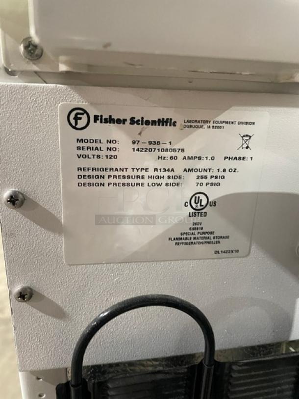 Fisher Scientific white undercounter flammable storage unit, Model 97-938-1, SN: 1422071080575. Includes poly-coated wired rack.