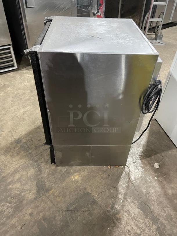 Glastender MFV24GNL 2018 stainless steel mug chiller with glass door, black powder coat, poly-coated rack, 120V, single phase.