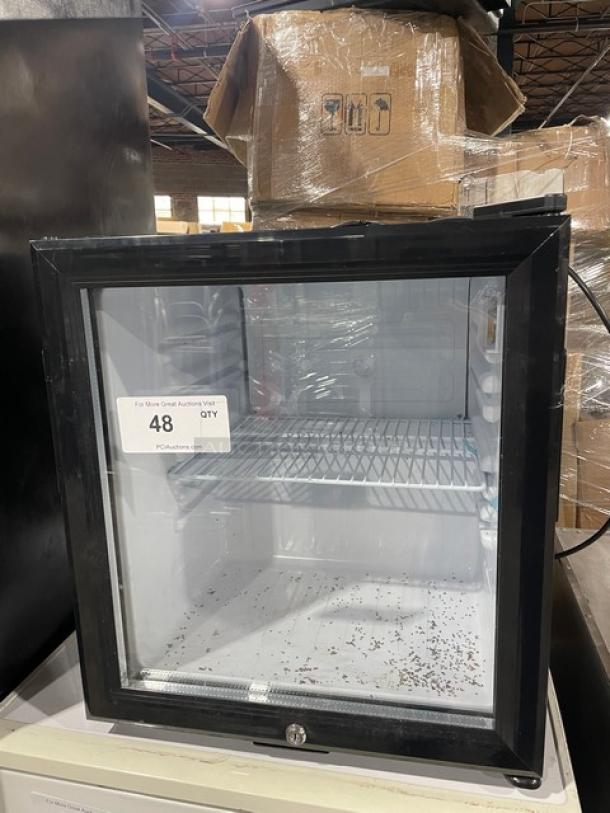 Nordon SC52 commercial black single glass door countertop merchandiser refrigerator, features poly coated wired rack, 120V.