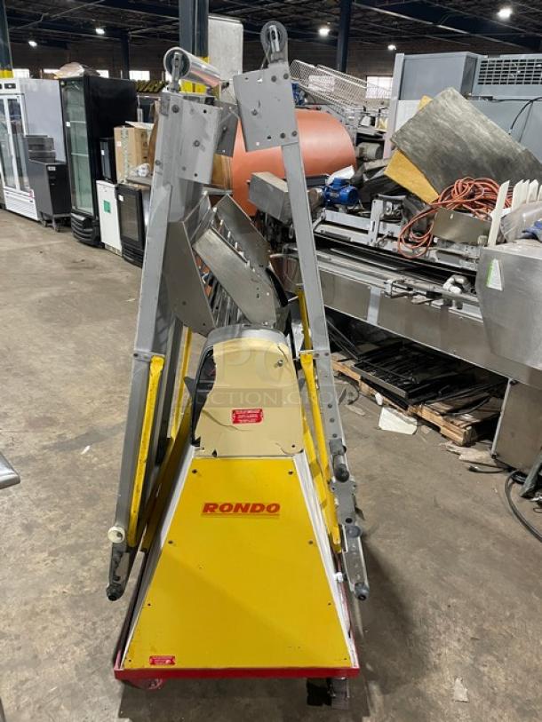 Seewer Rondo SS064C reversible dough sheeter with fold-up conveyor, model SS064C, SN: A6019004, on casters, in used condition.