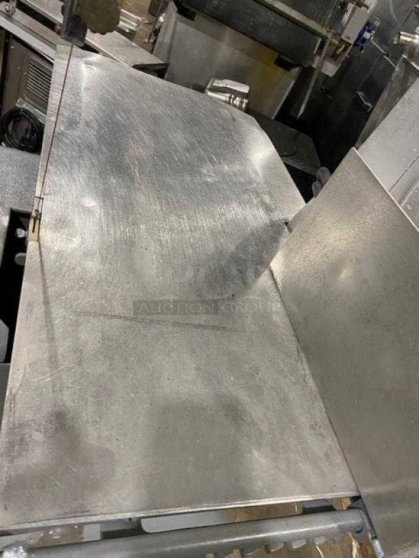 Butcher Boy B16 heavy-duty meat band saw, stainless steel, electric-powered, model B16 SN: 6-8427, 208V 3 phase, on legs.