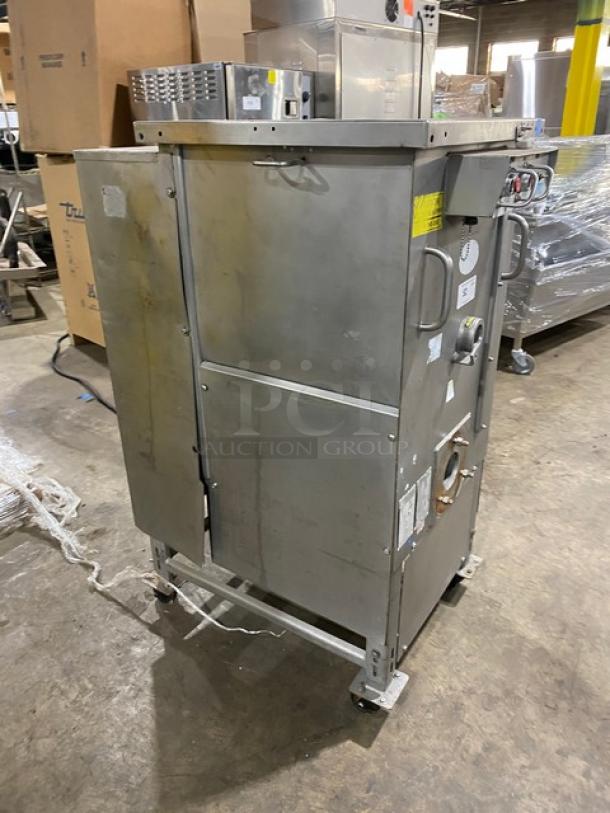 Biro commercial stainless steel electric meat mixer/grinder on casters. Heavy-duty, free-standing, well-maintained condition.