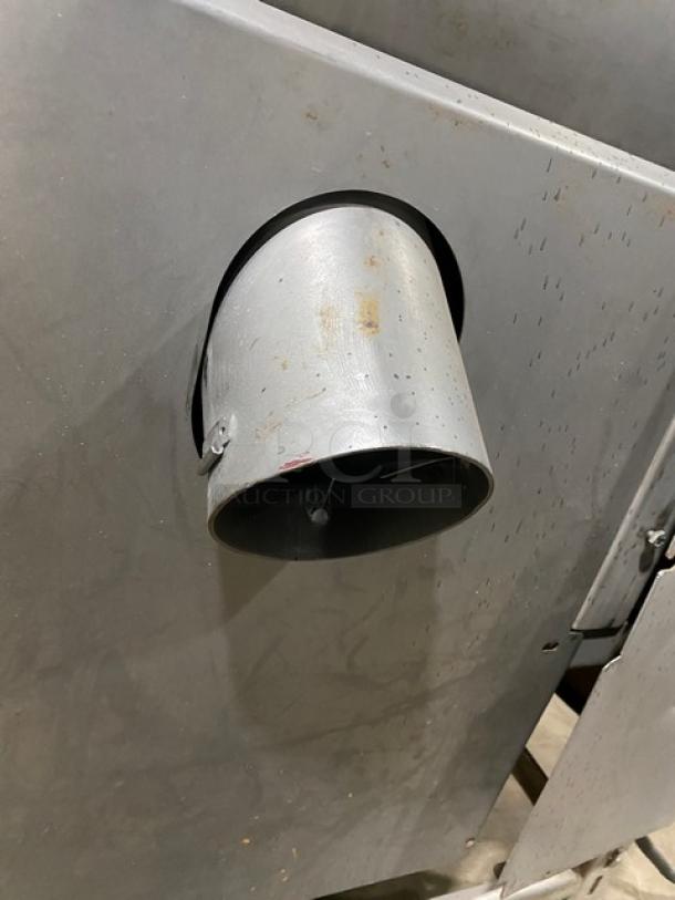 Biro commercial stainless steel electric meat mixer/grinder, free-standing, on casters; visibly used condition.