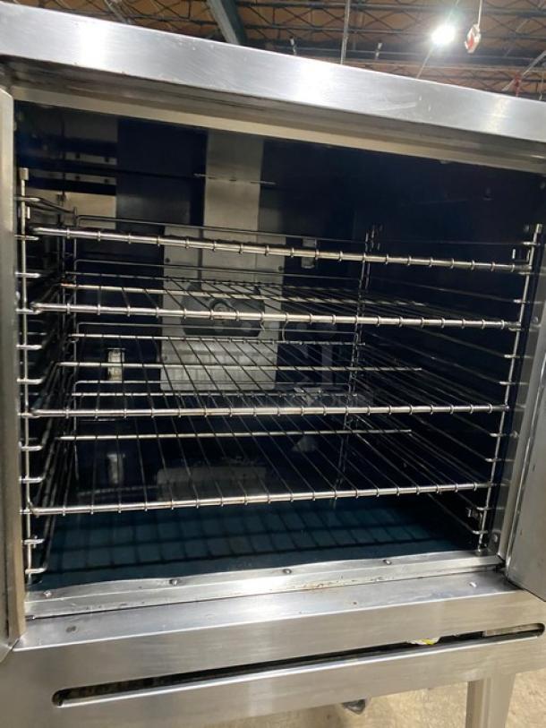 Imperial Commercial Stainless Steel Natural Gas Single-Stack Convection Oven, Model PCVG1, with wired rack, on casters.