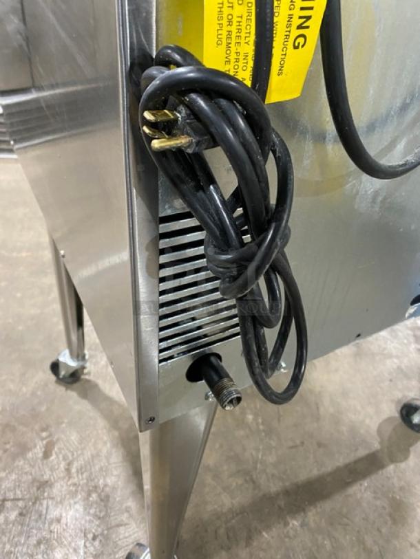 Imperial PCVG1 stainless steel convection oven, natural gas, on casters, includes wired oven rack, SN: 08159322, near cords.