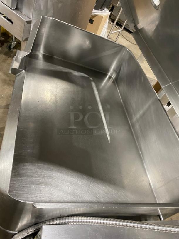 Groen 40 Gal. tilt skillet, model NHFPE4, stainless steel, on legs, natural gas, with single spout faucet, good condition.