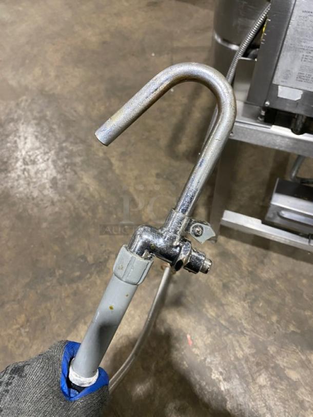 Groen NHFPE4 stainless steel 40-gallon skillet with faucet; natural gas-powered; on legs; industrial use.