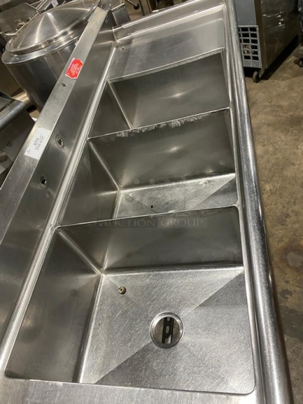 Wasserstrom 3-compartment stainless steel sink with side drain boards, on legs. Clean, minimal wear. Suitable for commercial use.