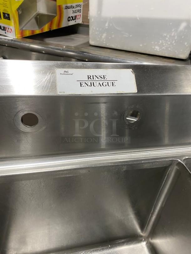 Wasserstrom stainless steel 3-compartment sink with left and right drain boards, on legs. "Rinse" label visible.