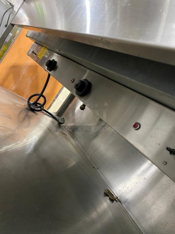 Atlas Metal WIHD&M4 stainless steel 4-well hot food table with sneeze guard, controls, and casters, SN: 14063336A, 208V.