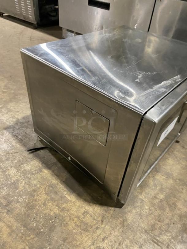Menumaster RFS12TSW commercial stainless steel countertop microwave oven, 120V, digital push button controls, used condition.