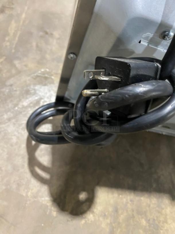 Menumaster RFS12TSW commercial microwave, stainless steel, electric-powered, 120V, with digital push button controls.