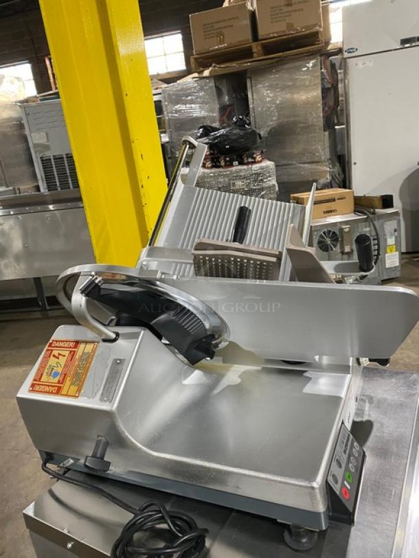 Bizerba SE12D commercial deli meat slicer on legs, electric-powered, 120V, heavy-duty, with safety labels, in good condition.