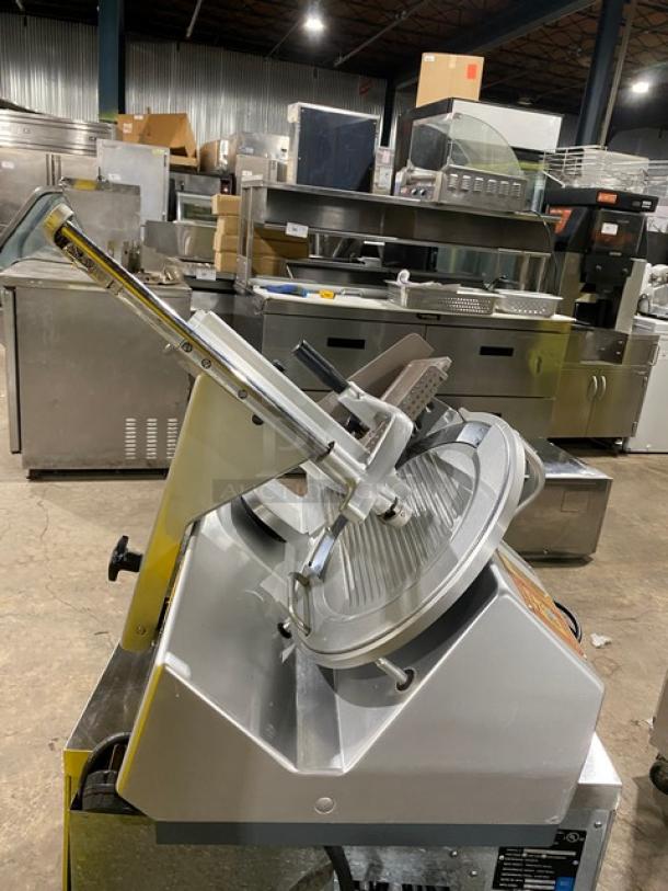 Bizerba SE12D commercial deli meat slicer, electric-powered, 120V, heavy-duty, on legs, in good condition.