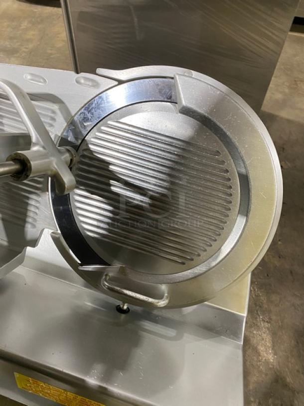 Bizerba SE12D electric deli meat slicer, heavy-duty, countertop model on legs, 120V, showing slicer blade and controls.